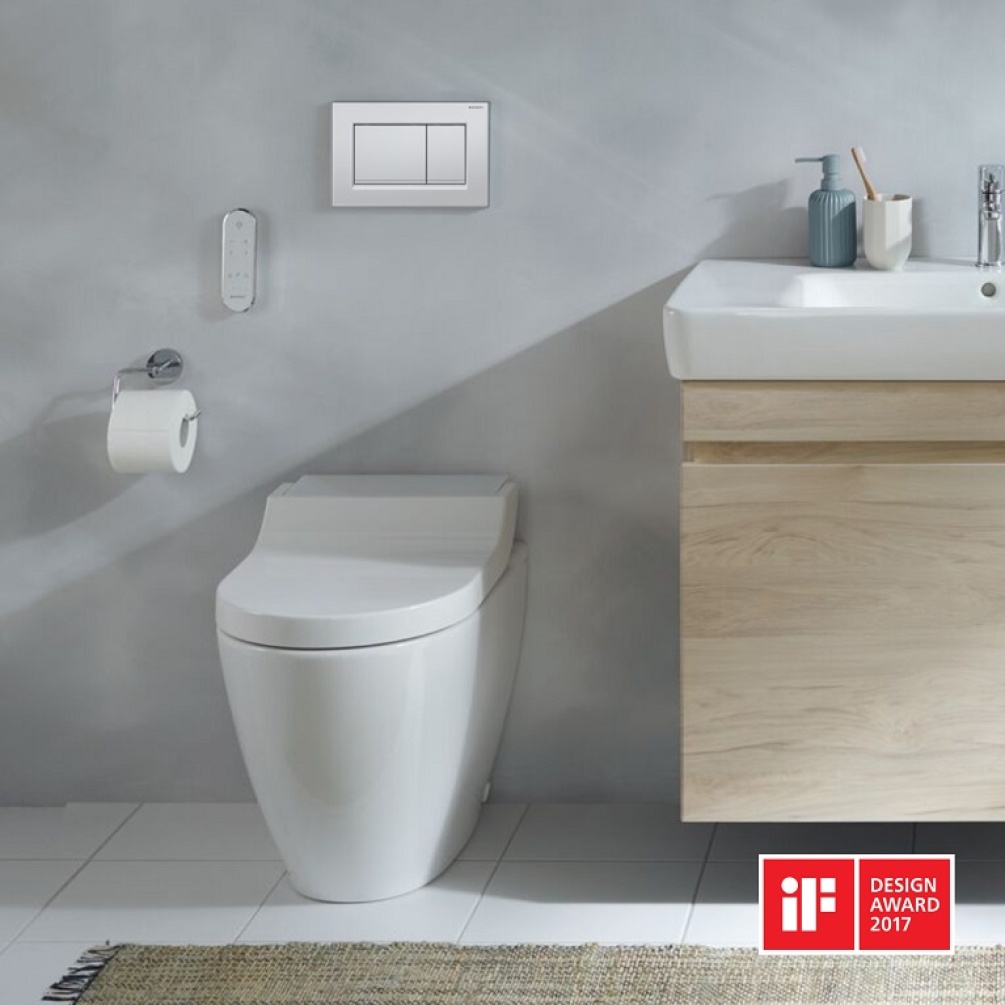 Product lifestyle image of Geberit AquaClean Tuma Comfort Floorstanding Back to Wall Toilet -  White Alpine - 146.310.11.1